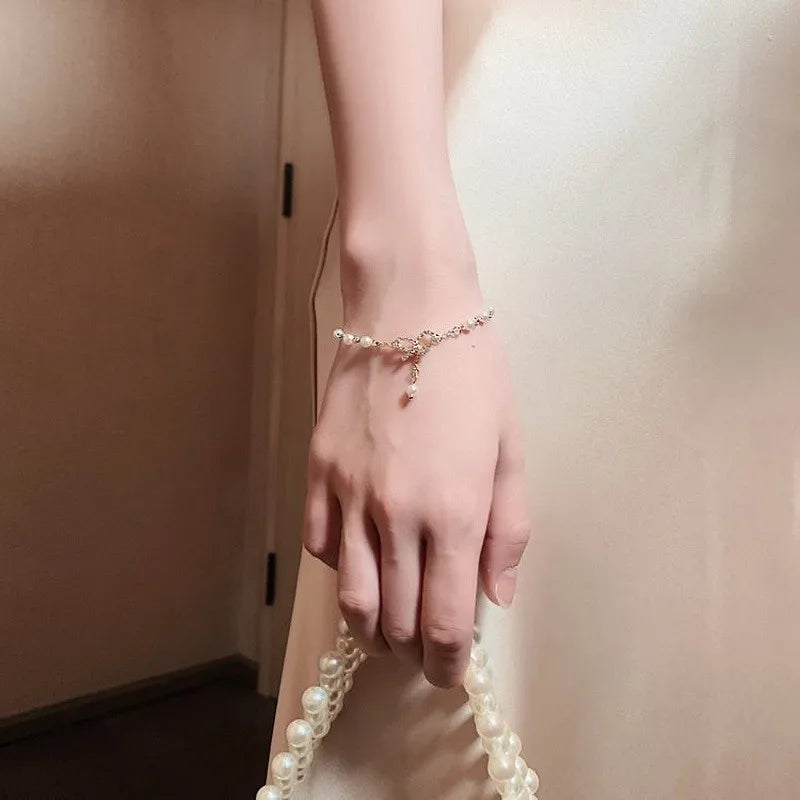 Korean Pearl Bow Charm Bracelet