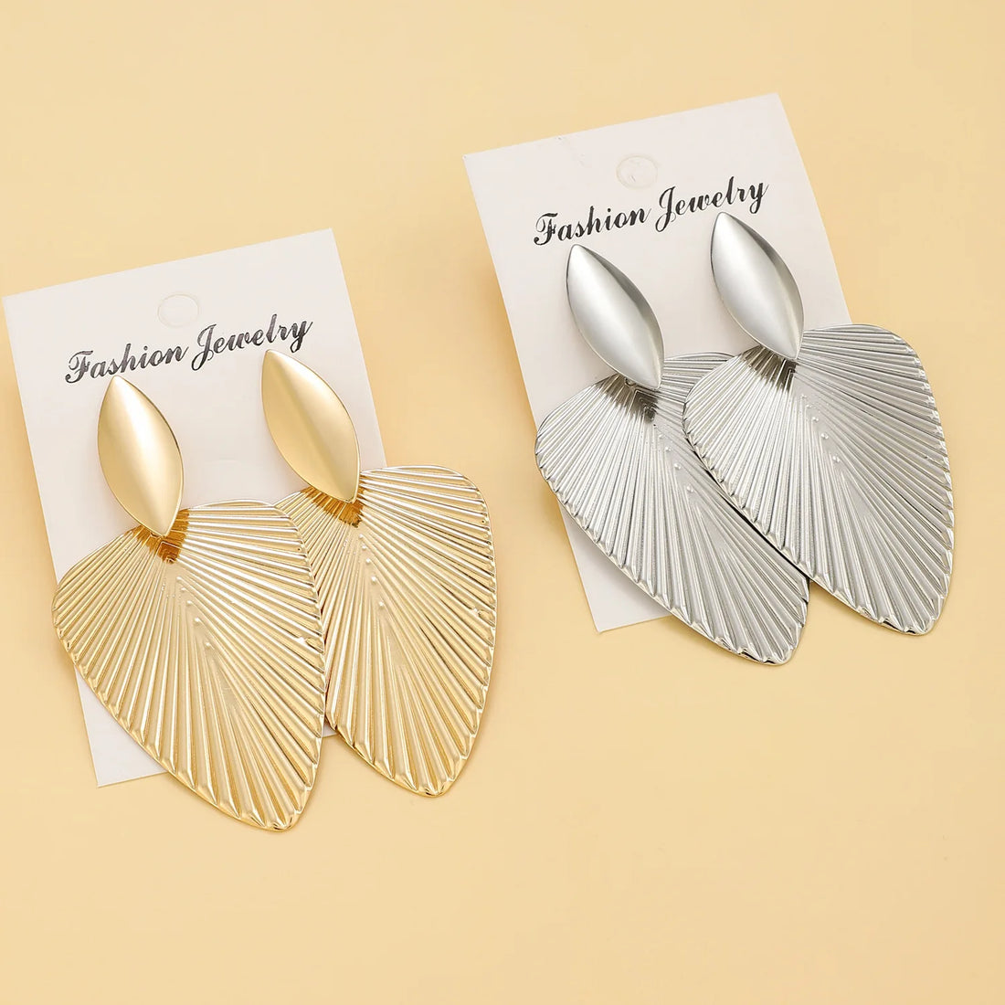 Gold Metal Leaf Pendant Drop Earrings